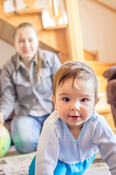 istock Cute baby with young mather 513371654
