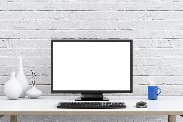 istock Large PC monitor in front of a brick wall 513372296