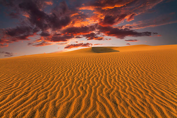 istock Majestic fiery sunset in the Gobi Desert. Mongolia. 513373370