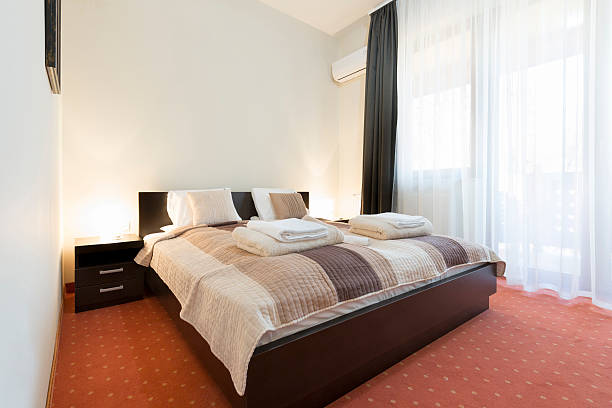 istock Interior of a double bed hotel room 513374000