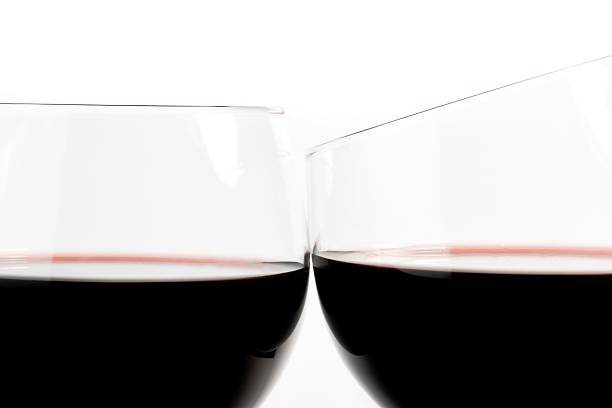 Glass of red wine. Beautiful ORANGE background