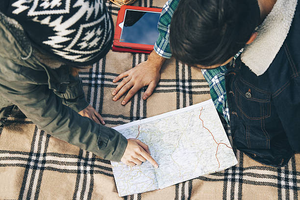 istock Hiking couple with map in mountain 513378848