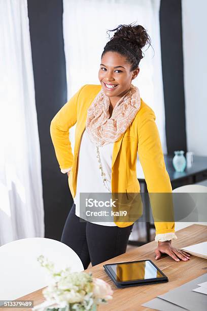 Stylish Young Woman Working Stock Photo - Download Image Now - African Ethnicity, Office, African-American Ethnicity