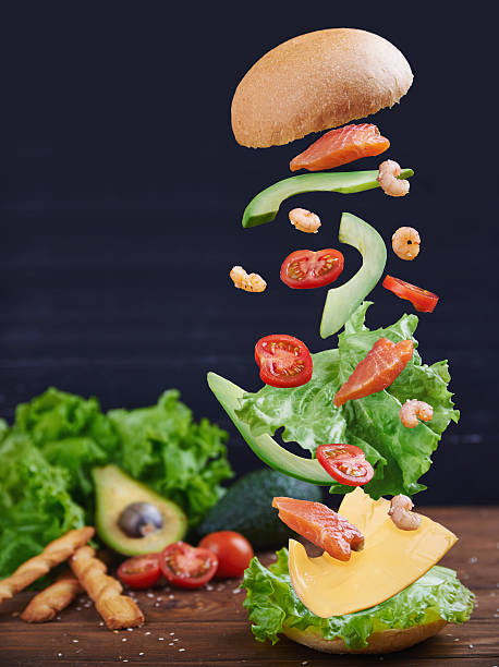 istock Fish burger with shrimps in motion 513380422