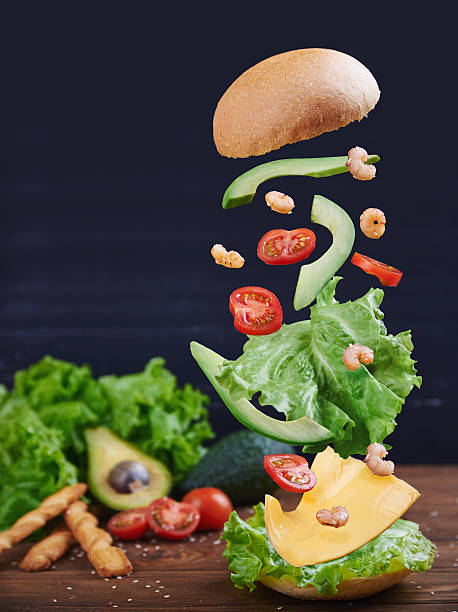 Fish burger with shrimps in motion