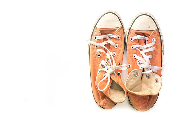 istock old sneakers isolated on white 513380602