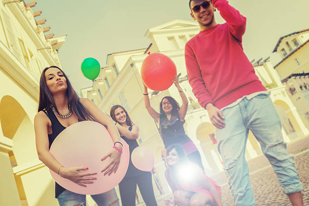 istock Teenagers with balloons 513381701