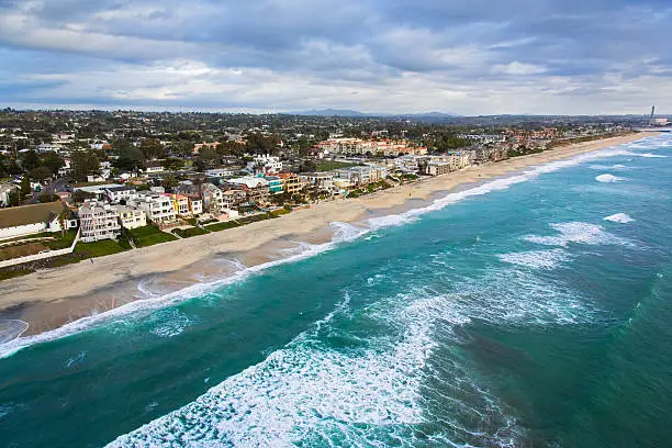 The coast and beaches of the beautiful city of Carlsbad, California located in northern San Diego County.  I shot this image during a chartered photo flight in a helicopter at approximately 300 feet elevation over the ocean.  