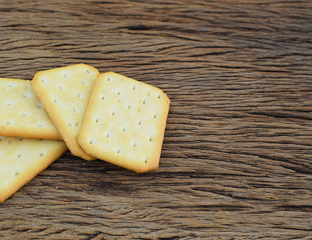 istock Biscuits with sesame seeds on wood background 513384834