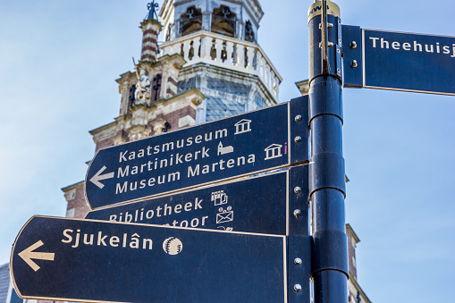 Tourist sign in front of the town hall in Franeker, Netherlands