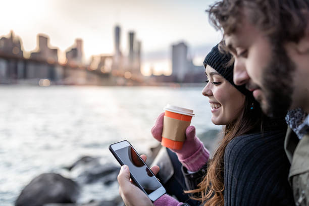 istock Young Couple Enjoying Sunset at Brooklyn Bridge, NYC 513387826