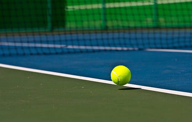 istock Tennis balls are falling ground. 513389128