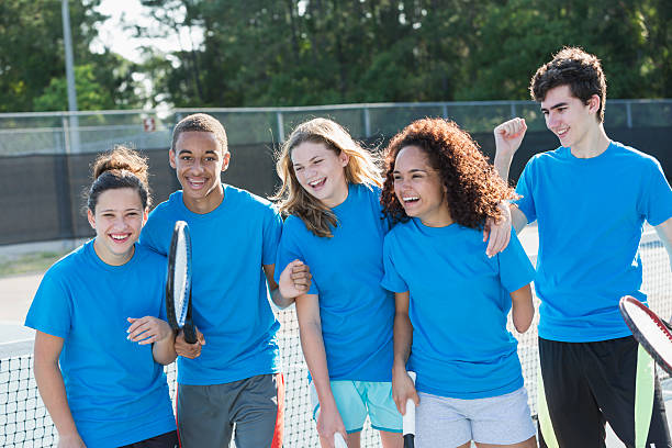 istock Teenagers playing tennis 513392427