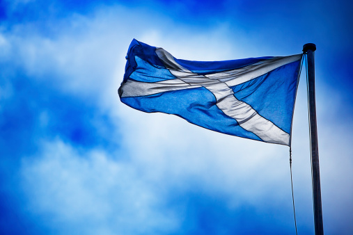 A scottish flag waves in the wind