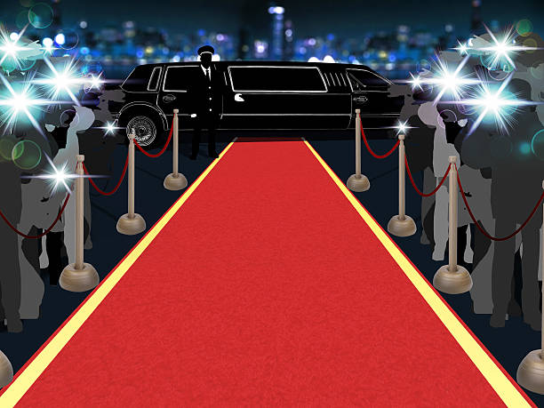 istock Red carpet, photographers, driver and a luxury car 513392661