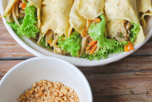 Delicious fresh (non-fried) egg spring rolls. With lettuce, carrots, and other fillings. Traditional Asian cuisine. All wholesome, home-made ingredients.