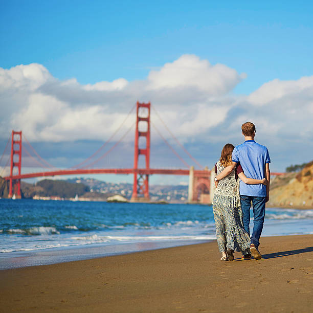 istock Couple having a date on Baker beach in San Francisco 513393416
