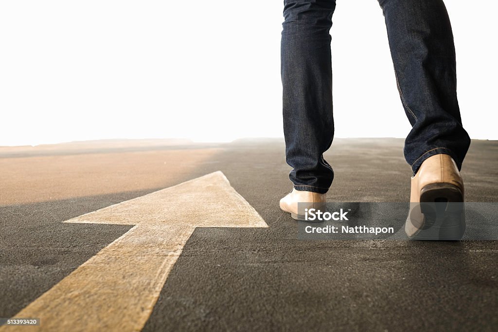 Concept of a man follows the right way The Way Forward Stock Photo