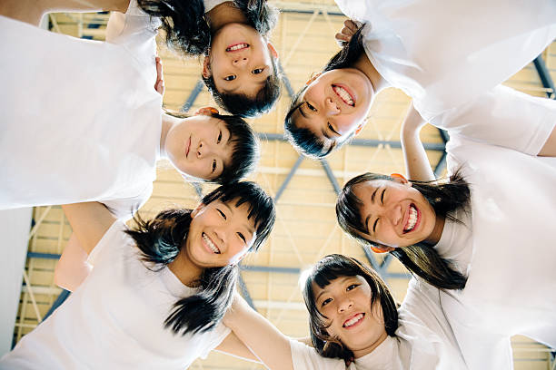 Japanese Female Students Teaming up Group of Japanese Female Students Teaming up child japanese culture japan asian ethnicity stock pictures, royalty-free photos & images