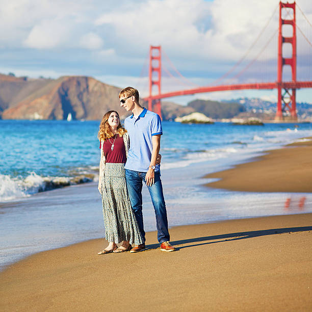 istock Couple having a date on Baker beach in San Francisco 513393570