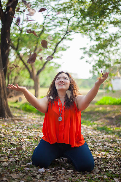 istock Happy a woman posing outdoor 513397543