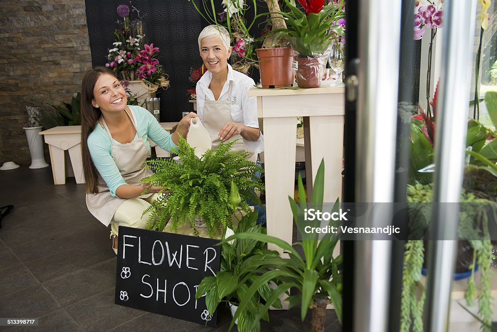 Flower shop Two smiling woman have successful small business named Flower shop 30-39 Years Stock Photo
