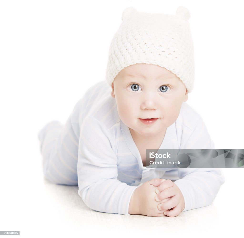 Baby Boy Portrait, Little Kid Crawling In Wolen Child Hat Baby Boy Portrait, Little Kid Crawling In Wolen Hat, Child Isolated Over White Background 0-11 Months Stock Photo
