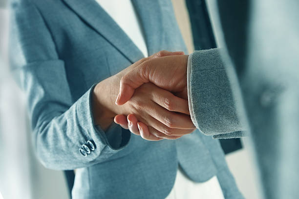 istock Business people shaking hands 513414591