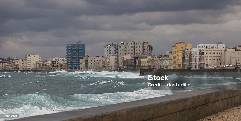 Cuba - Havana Stormy seas batter the sea wall of the Malecón in Havana, Cuba - January 2010 Building Exterior Stock Photo