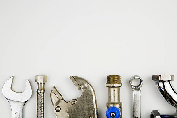 set of plumber tools stock photo