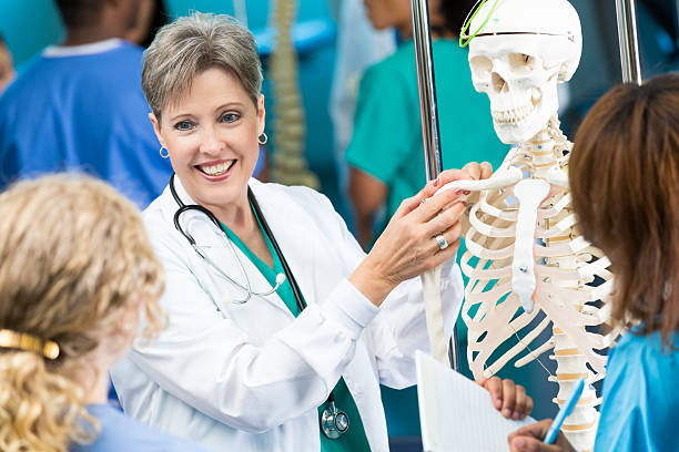 Medical school professor teaches anatomy class