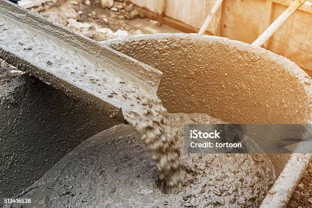 Pouring Cement During For Construction With With Vintage Tone Stock Photo - Download Image Now