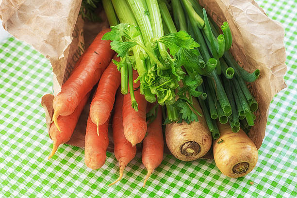 produce in paper bag, from farmer's market stock photo