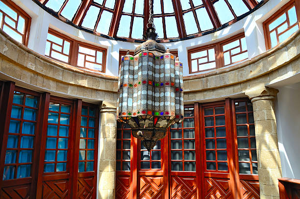 Moroccan lamp Big old-fashioned chandelier from glass in moroccan house marrakesh riad stock pictures, royalty-free photos & images