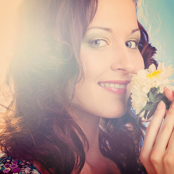 istock woman with flower 513417429