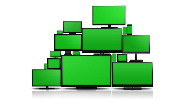 Many different types of screens with green screen Many different types of screens. TVs, computer monitors, smartphones and tablets. They laid on each other in a pile isolated on a white background. They are all with a green screen. large group of objects stock pictures, royalty-free photos & images