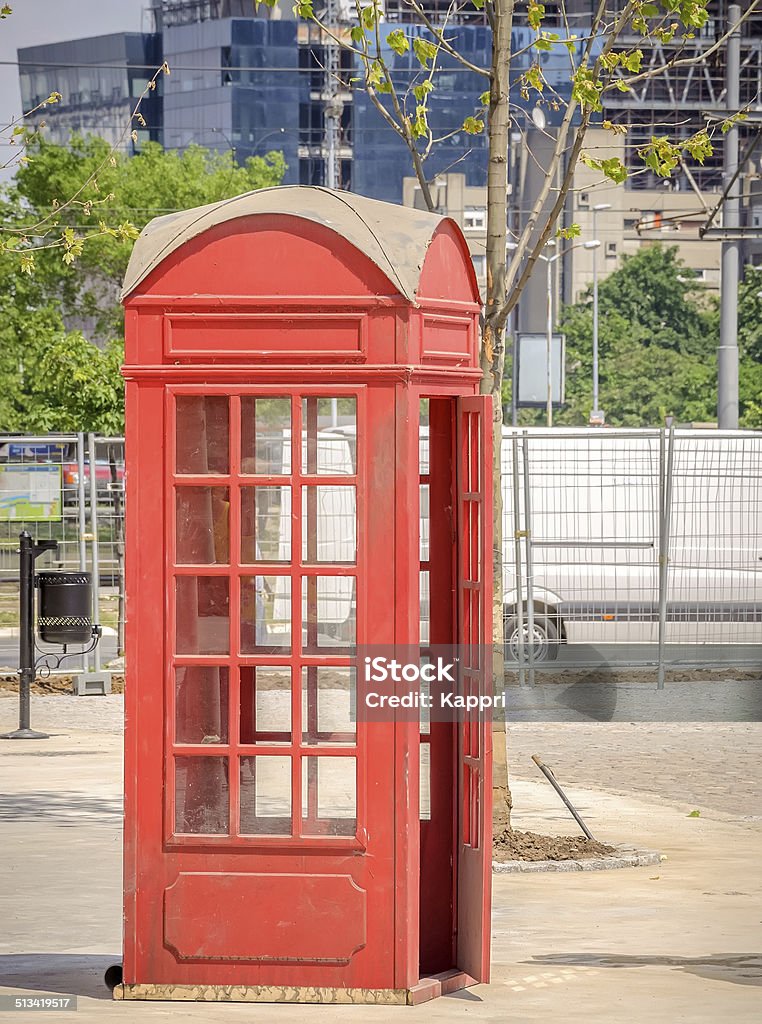 Red British Telephone Booth Red British Telephone Booth old and rustic British Culture Stock Photo