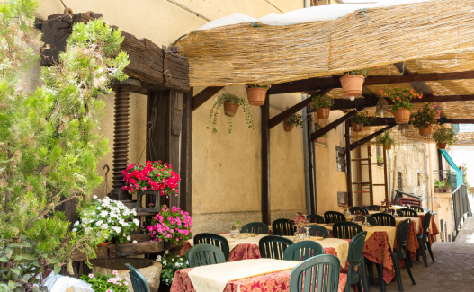 typical summer restaurant with outdoor courtyard for intimate romantic encounters