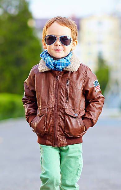 istock cool young kid walking the street 513421683