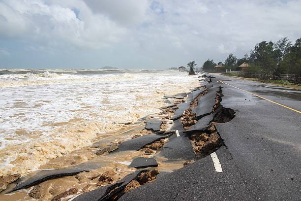 Beach Road slide by water and wind Beach Road slide by water and wind eroded photos stock pictures, royalty-free photos & images