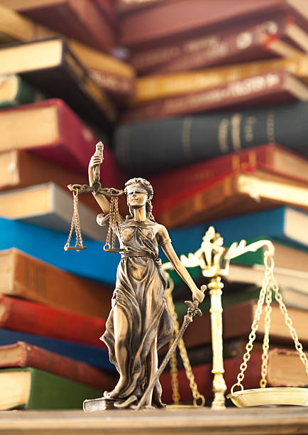 Law concept, statue and books stock photo