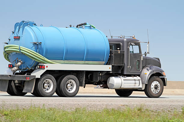 Septic Tank Pump Truck On Highway, Side View stock photo