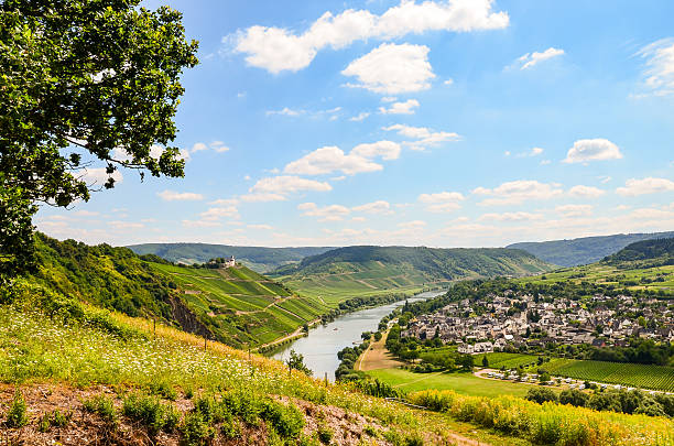 Moselle Valley Germany: View to Marienburg Castle and Village Puenderich View across the river Moselle to Marienburg Castle and village Punderich - Moselle valley wine region in Germany rhineland stock pictures, royalty-free photos & images
