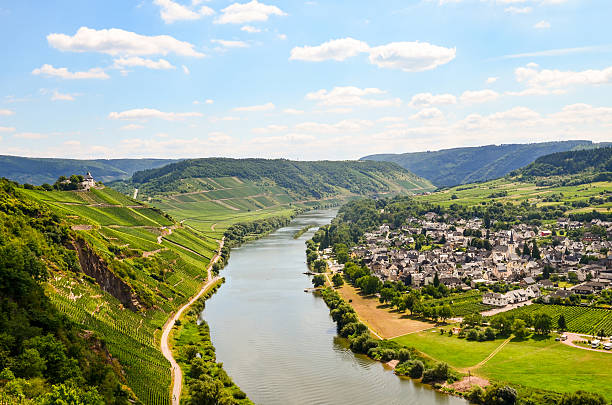 Moselle Valley Germany: View to Marienburg Castle and Village Puenderich View across the river Moselle to Marienburg Castle and village Punderich - Moselle valley wine region in Germany marienburg stock pictures, royalty-free photos & images