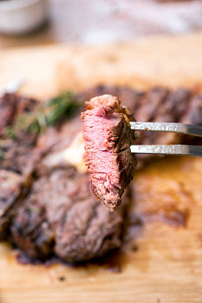 istock Delicious T-Bone Steak with Bite Taken Out 513435090