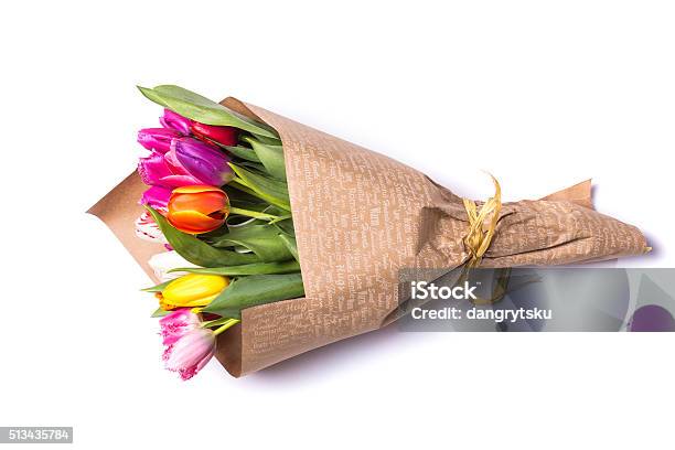 Bouquet Of Spring Tulips Flowers Wrapped In Gift Paper Stock Photo - Download Image Now