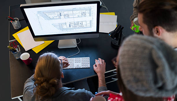 архитекторы на работе - engineering blueprint laptop construction стоковые фото и изображения