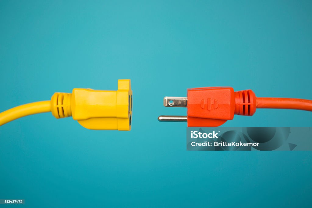 Yellow and Orange electric plug Electric Plug Stock Photo