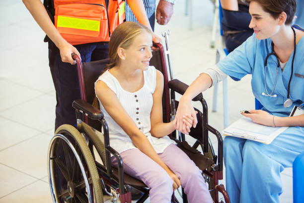 istock Nurse and patient holding hands in hospital 513438075
