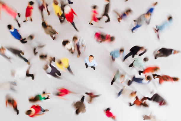 istock Businessman standing out from the crowd 513438541